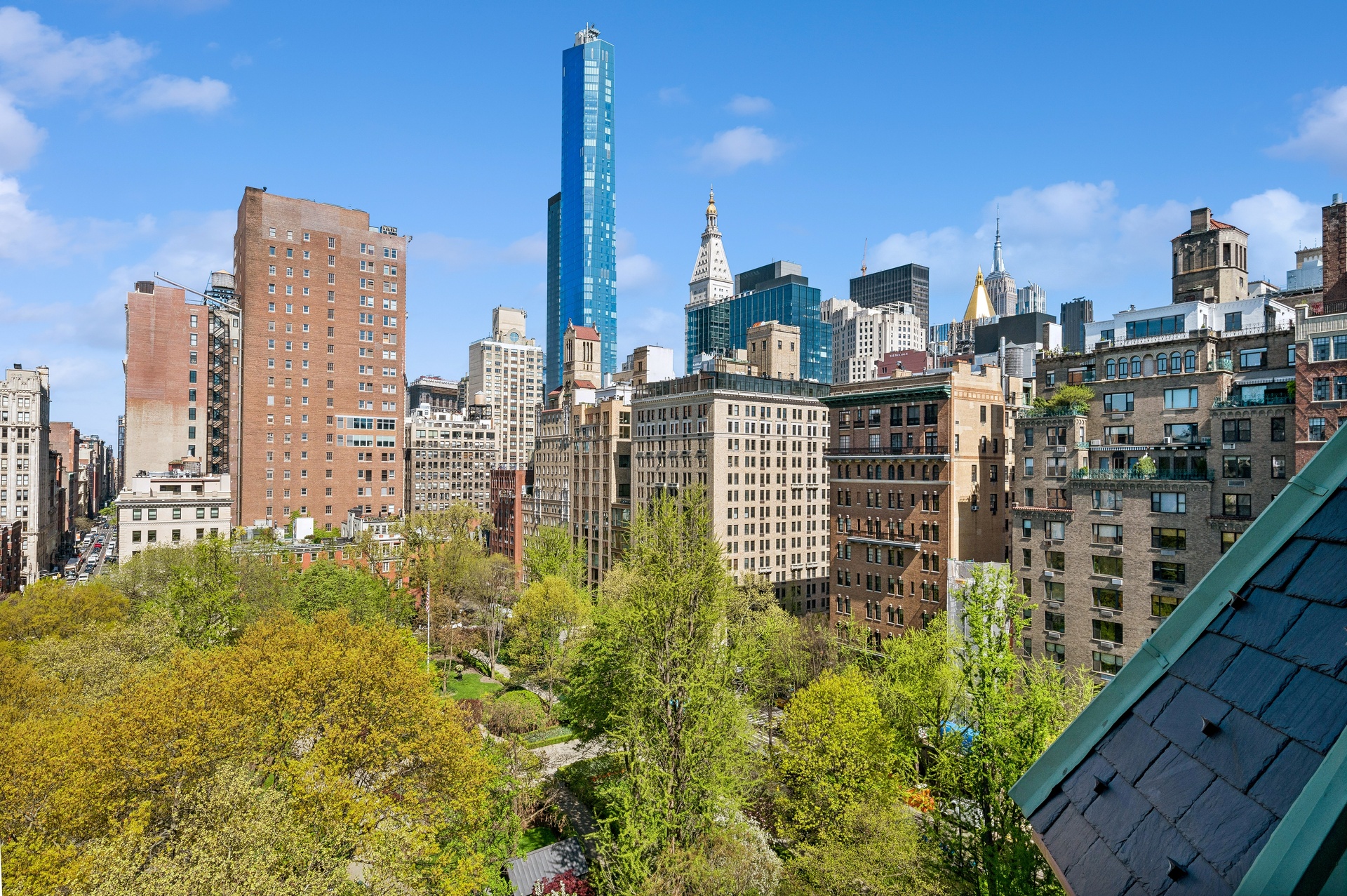 a view of a city with tall buildings