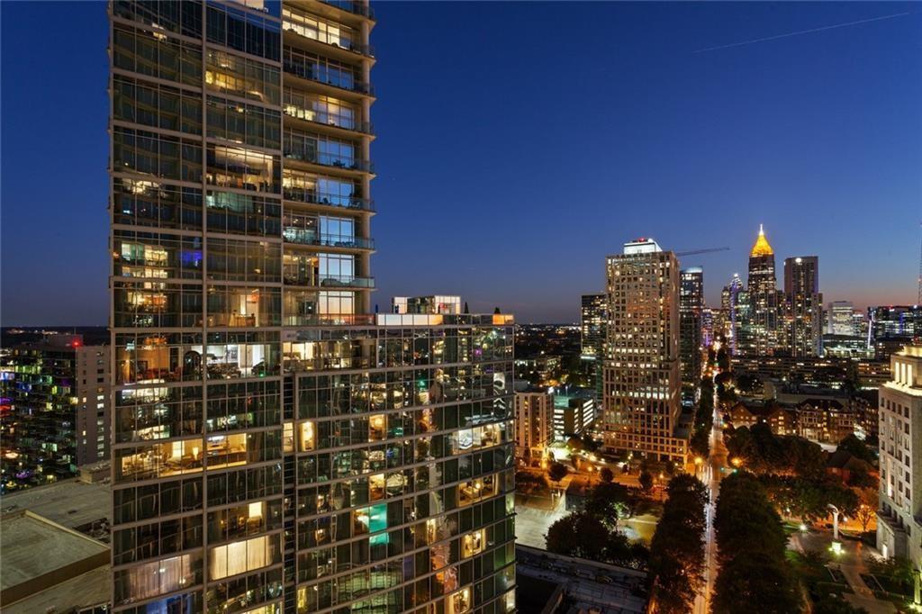 a view of a city with tall buildings