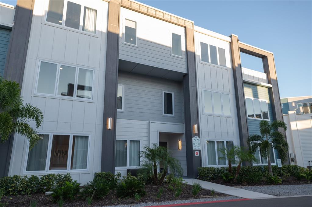 a front view of a multi story residential apartment building