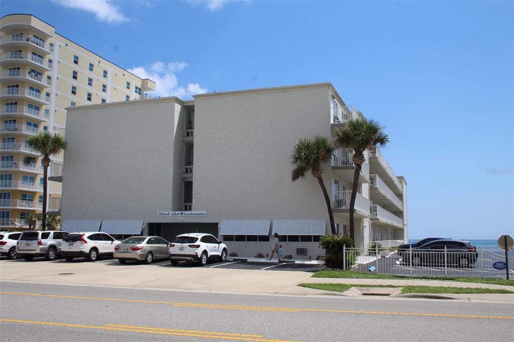 a cars parked in front of a building