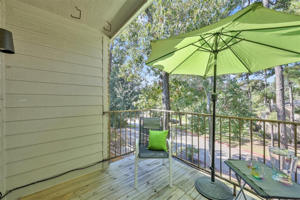 a view of a balcony with lake view