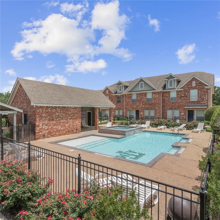 View of swimming pool with a patio area and an in