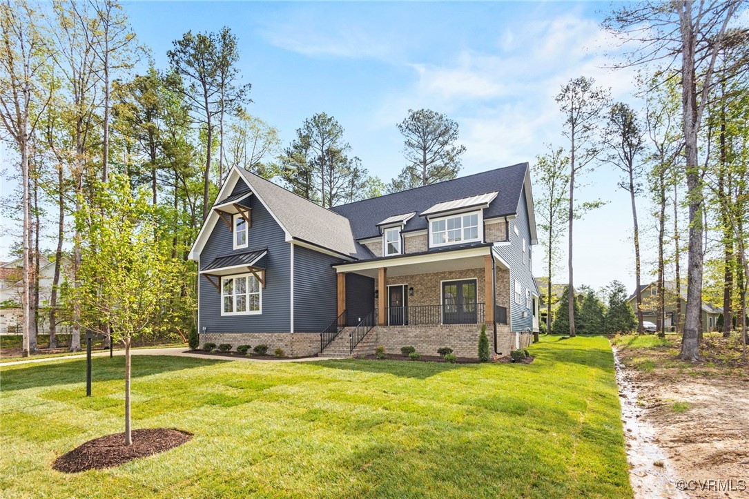 Craftsman inspired home with a porch and a front l