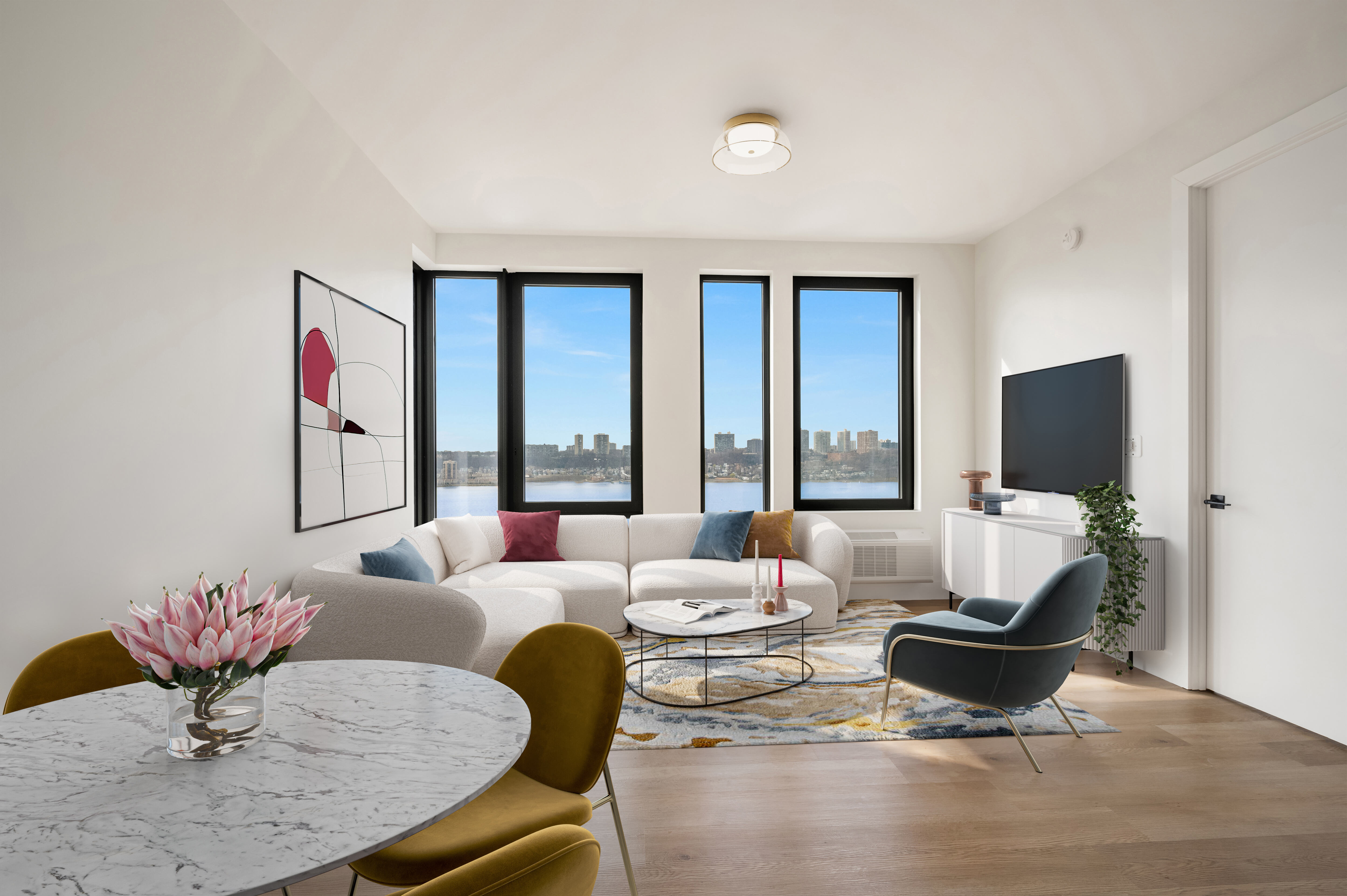 a living room with furniture and a flat screen tv