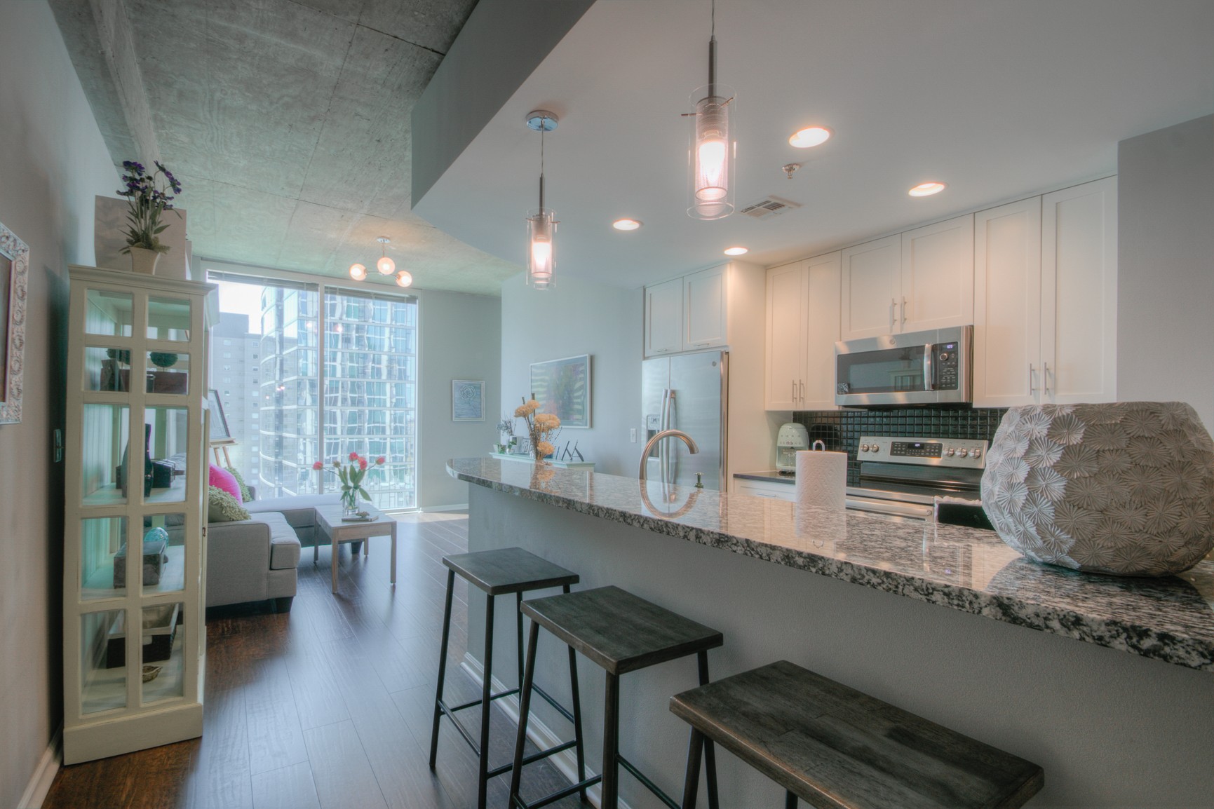 a kitchen with counter space cabinets and appliances