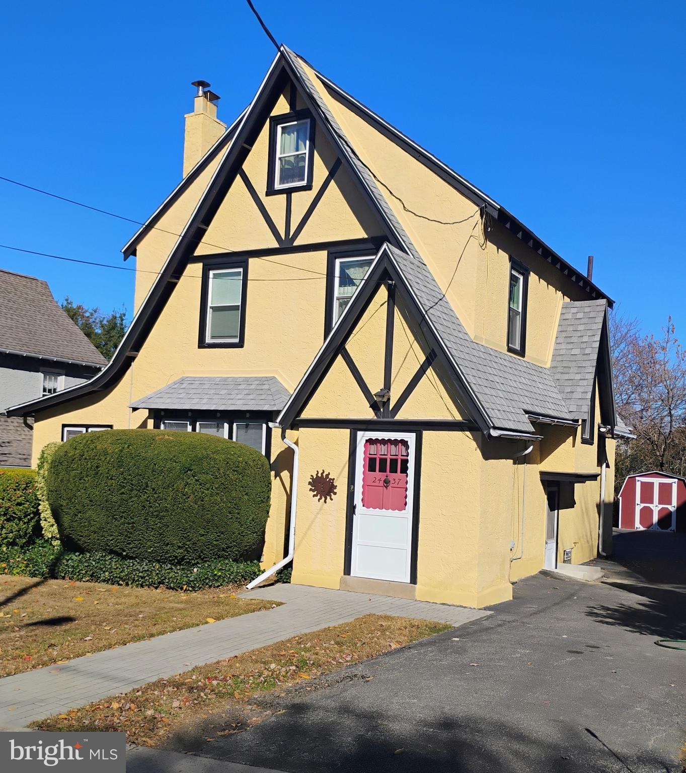 a front view of a house with garage