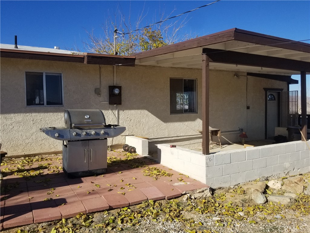 a front view of a house with patio