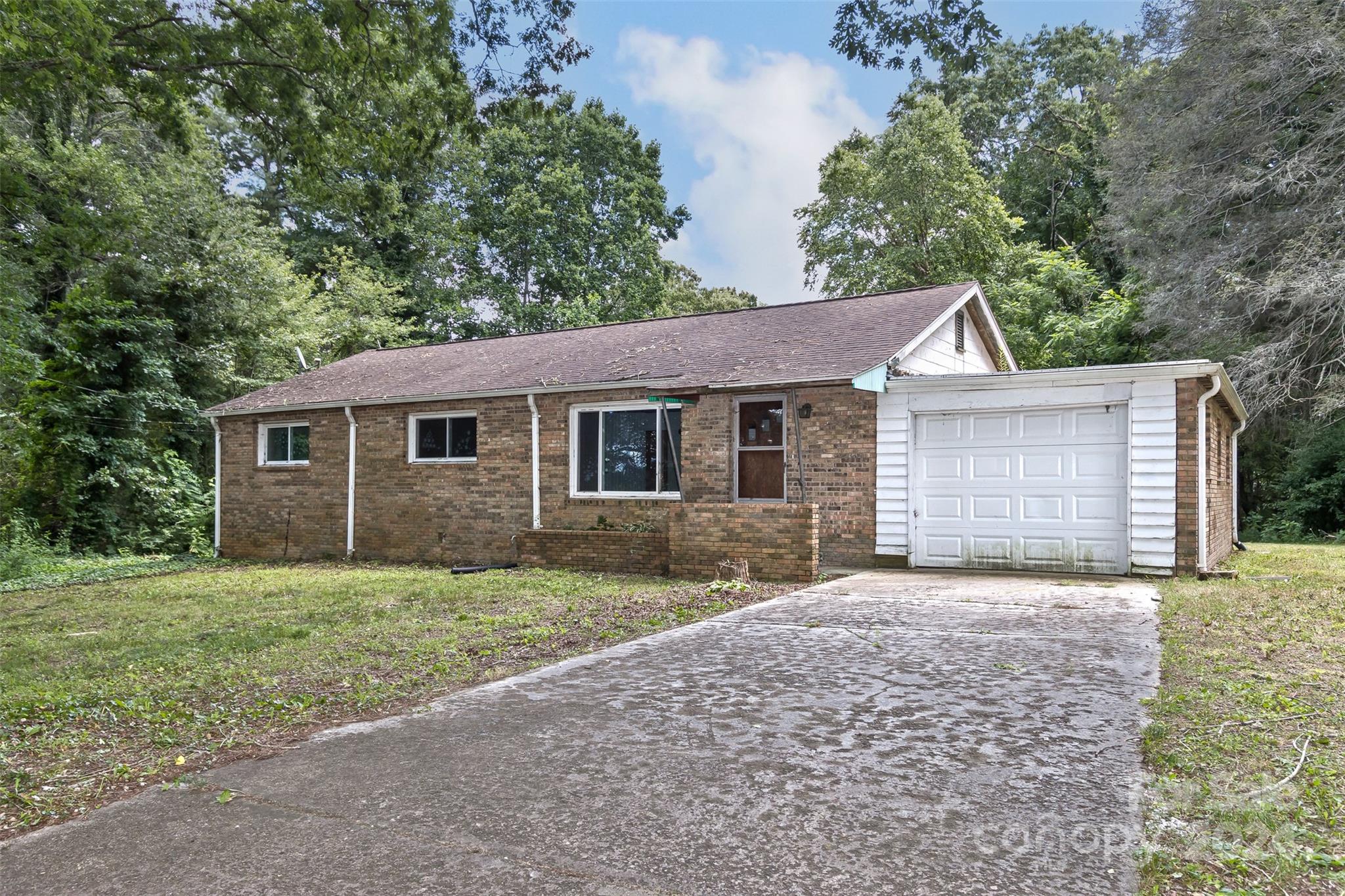 front view of a house and a yard