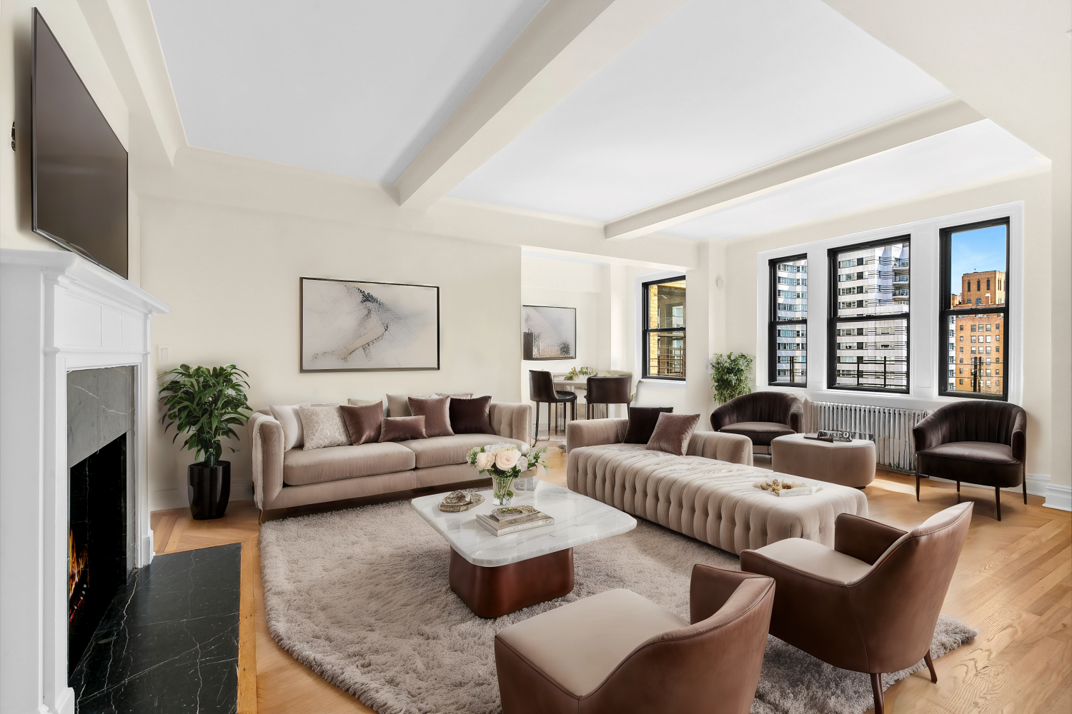 a living room with furniture and a flat screen tv