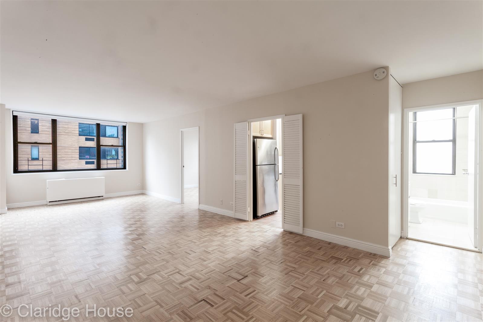 a view of an empty room with window