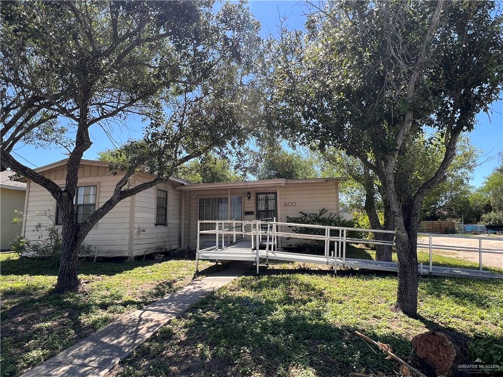 View of front of property with a front lawn