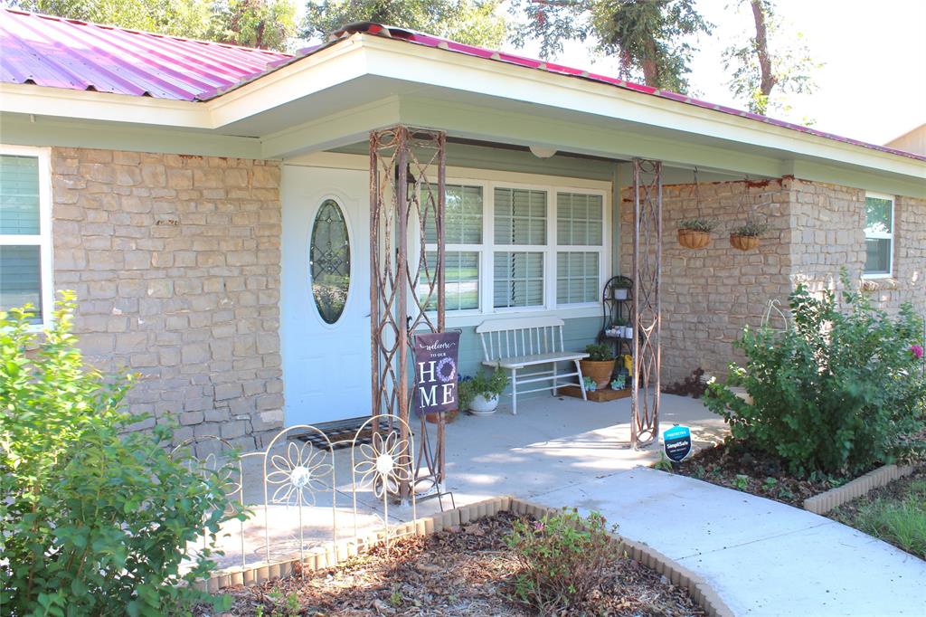 a front view of a house with patio