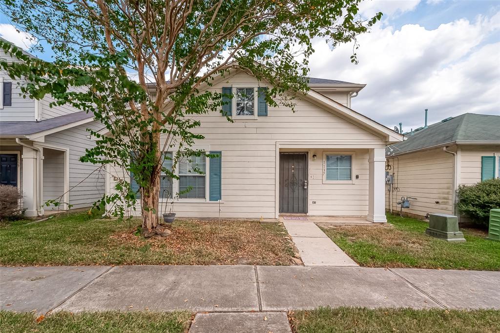 front view of a house and a yard