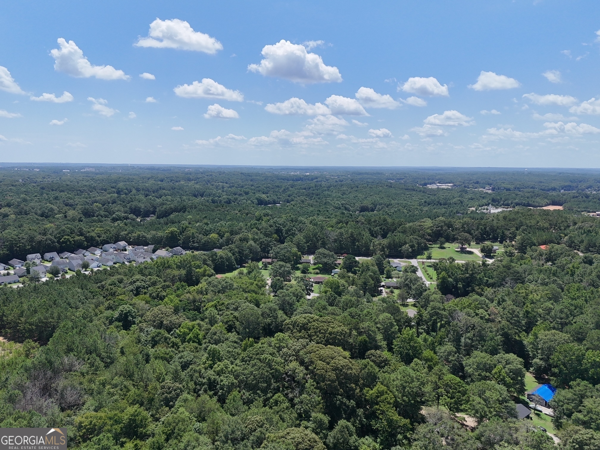 an aerial view of multiple house