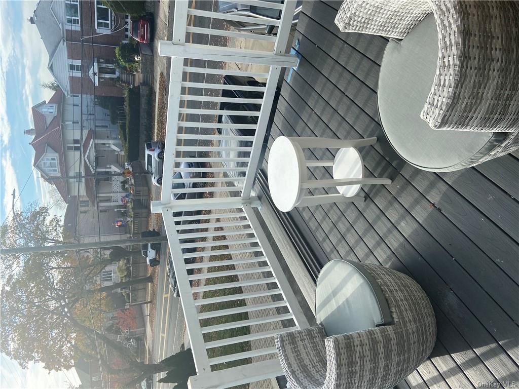 a view of a chairs and tables in the patio