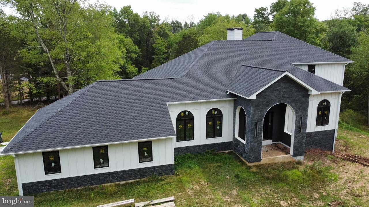 a house view with a garden space