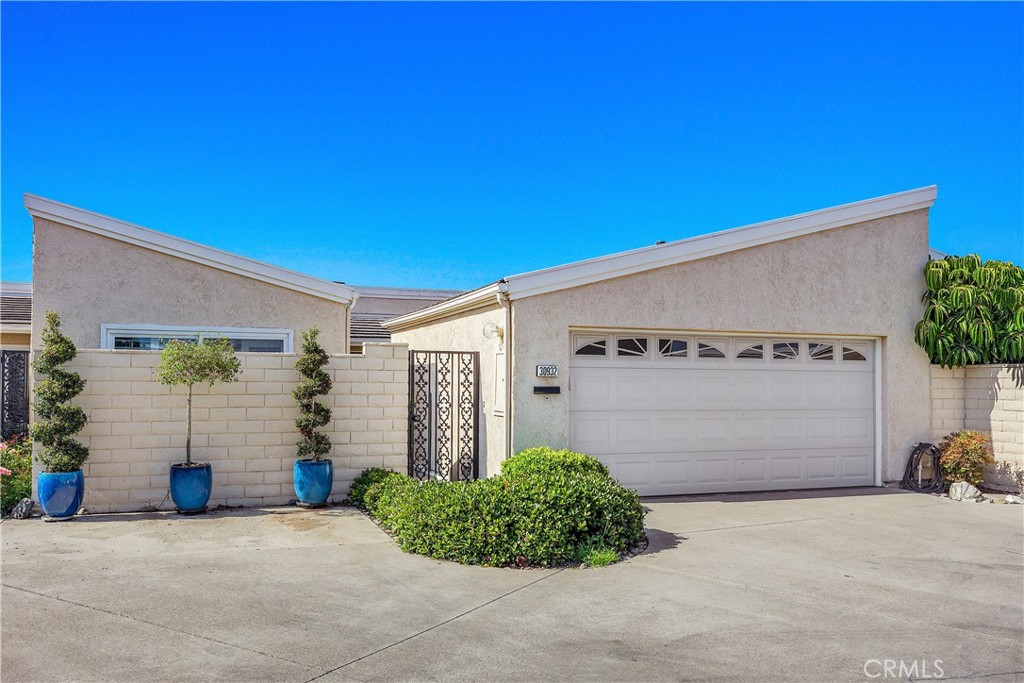 a view of a house with a garage