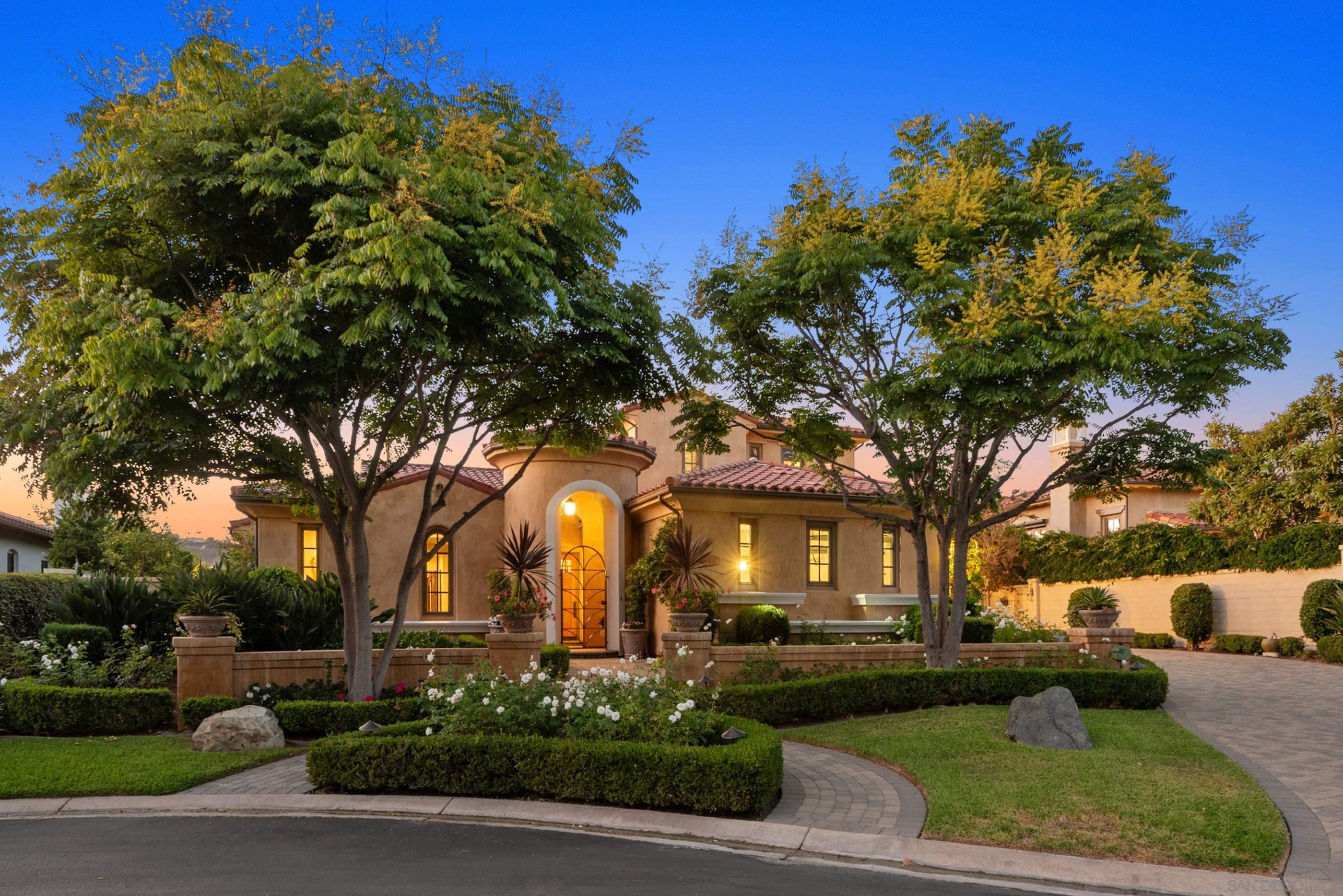 front view of a house with a garden