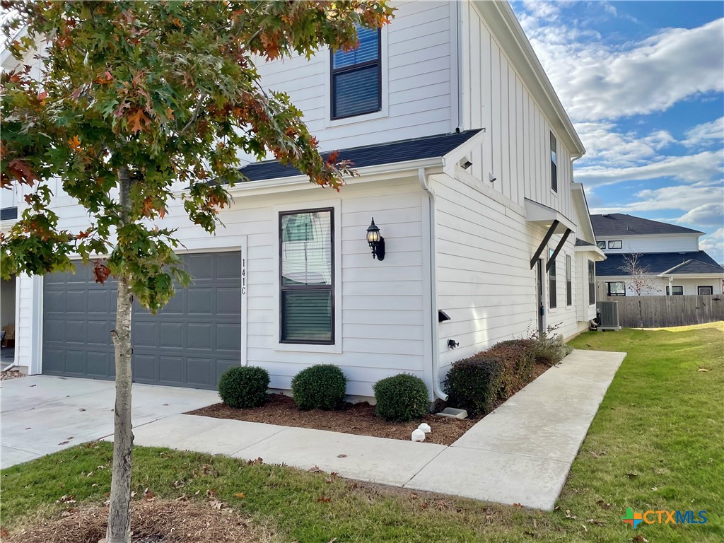 a front view of house with yard