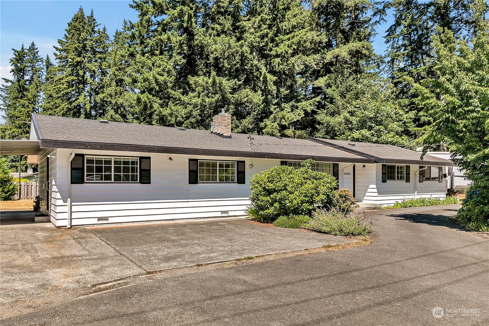 front view of a house with a patio