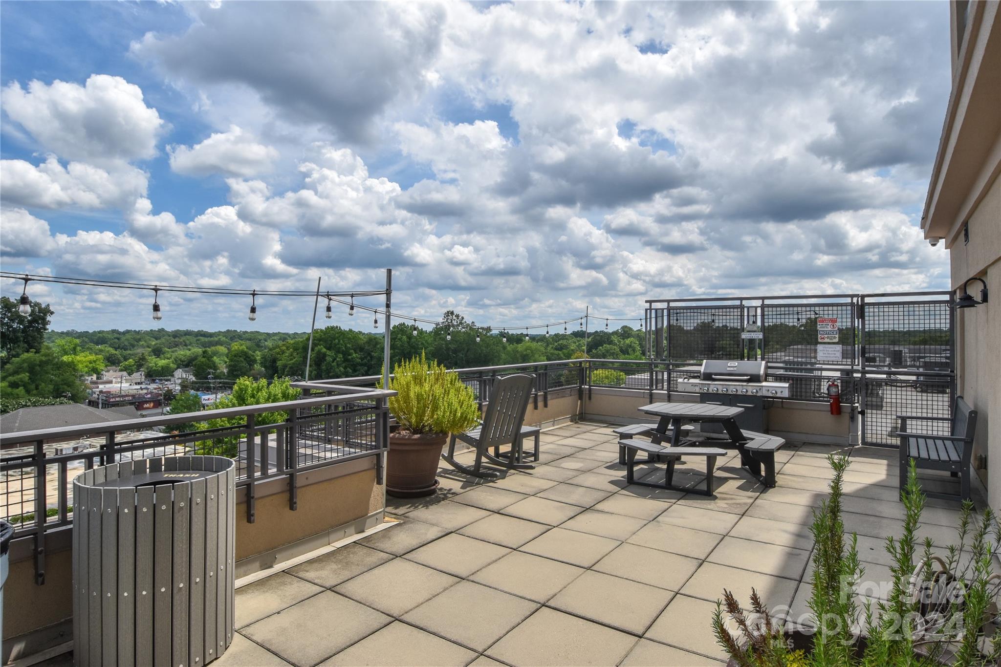 a view of roof deck with seating space