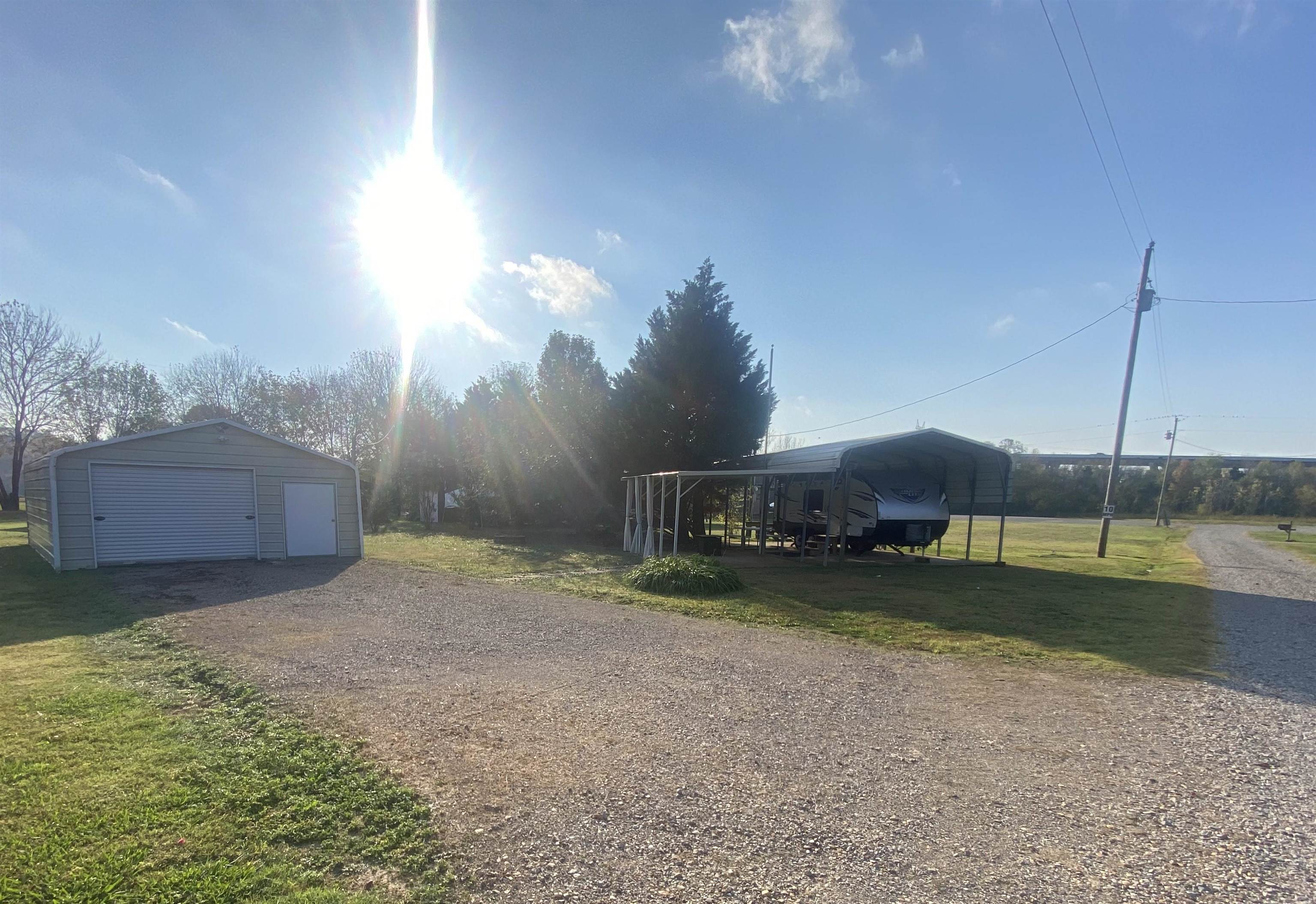 a view of a yard with an outdoor space