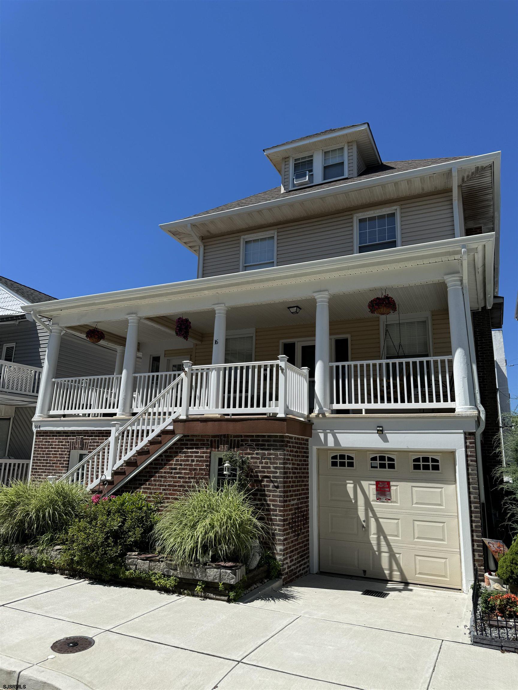 a view of a house with a garage