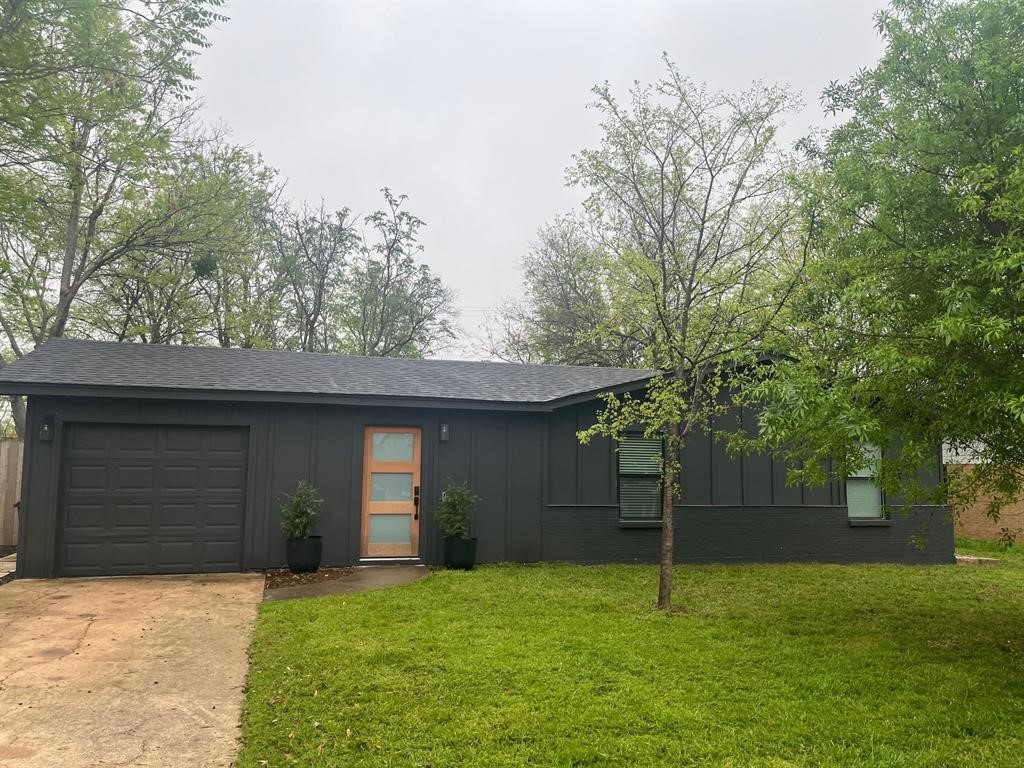 a house with trees in the background