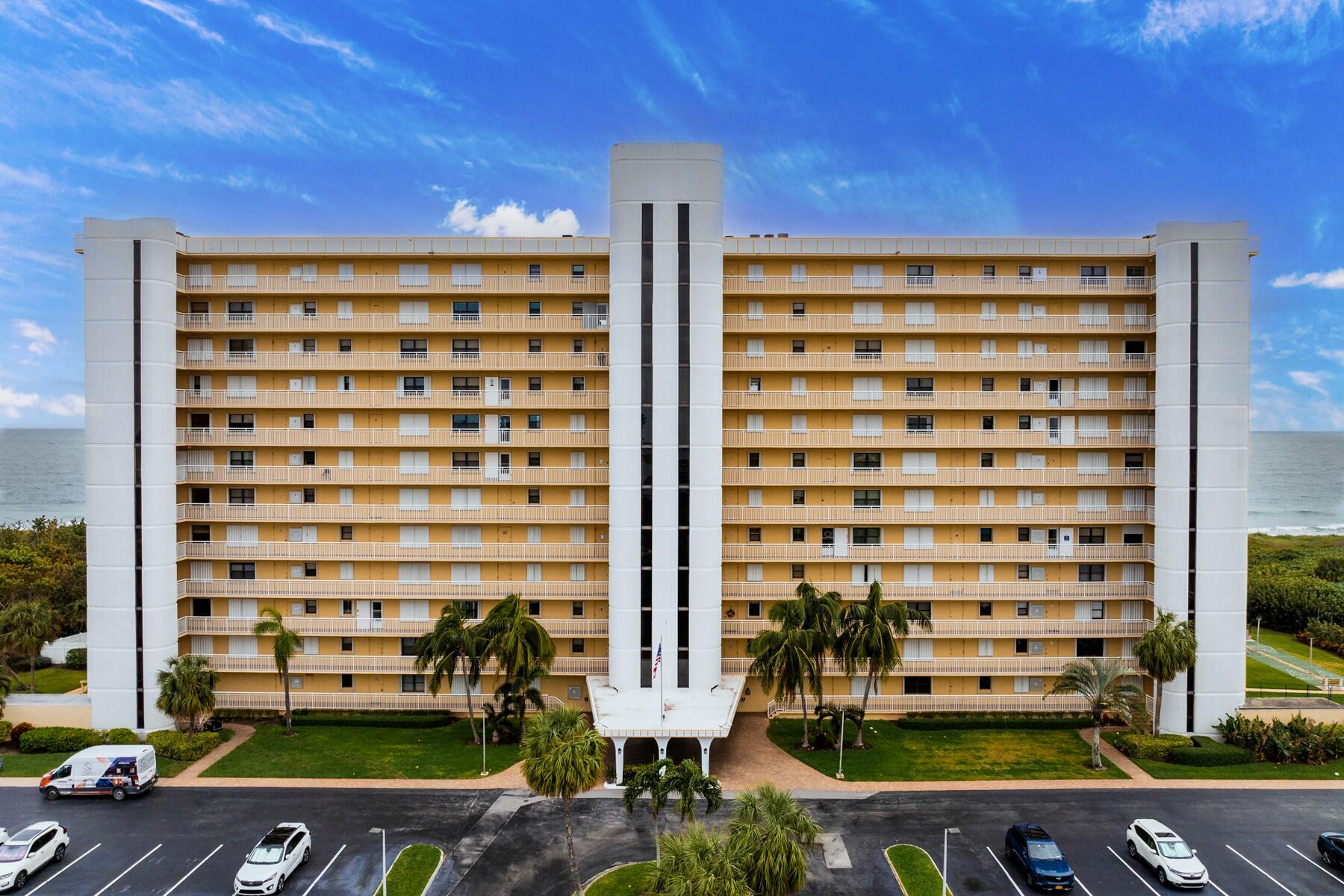 front view of building with a yard