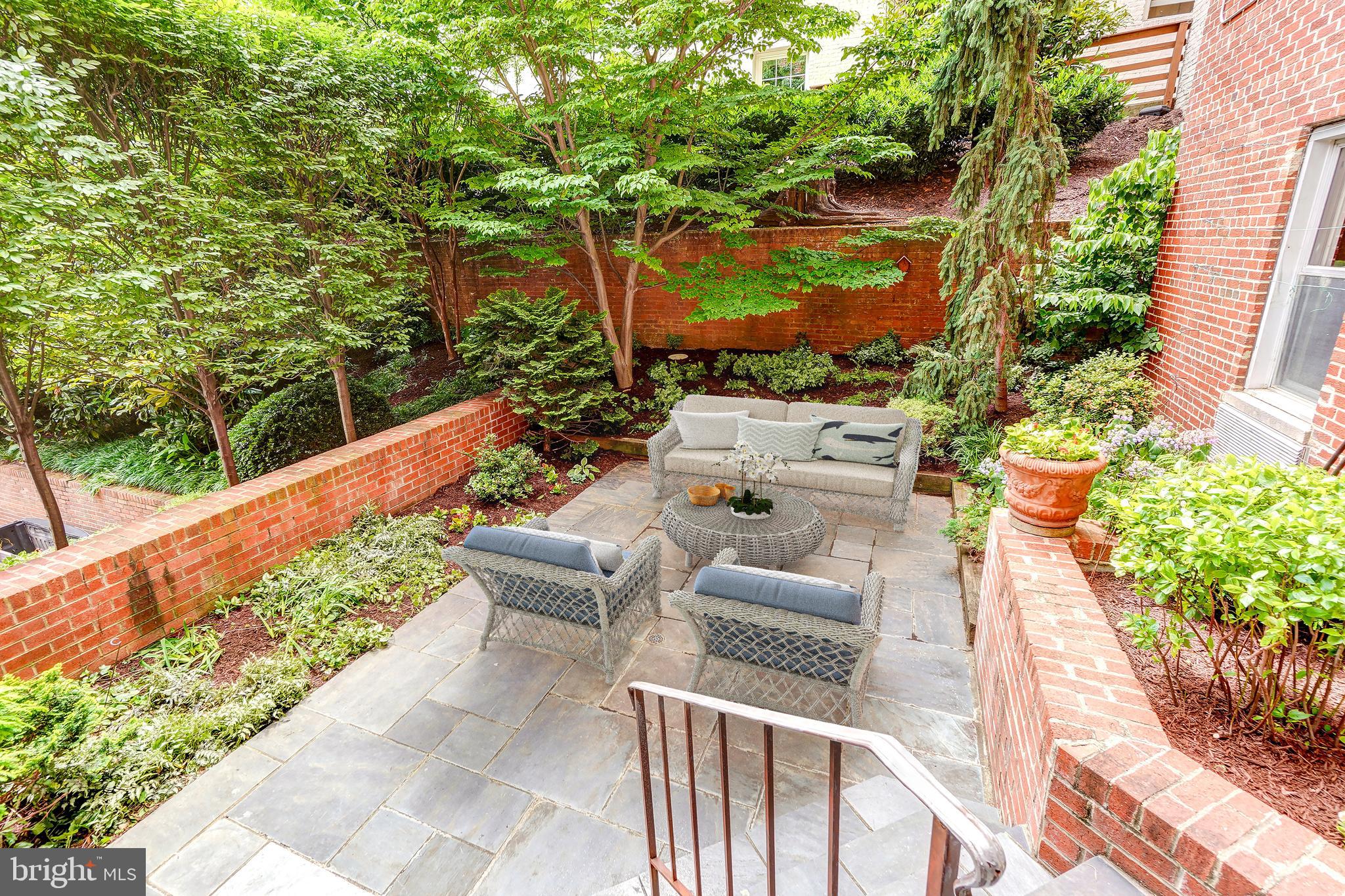 a view of balcony with furniture