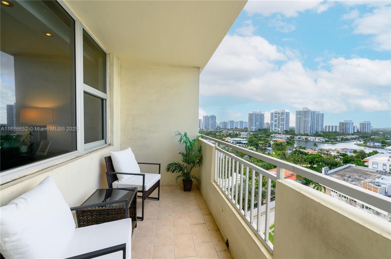 a view of balcony with furniture