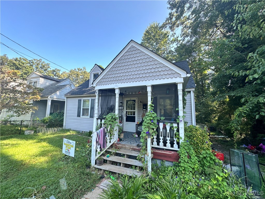 front view of a house with a yard