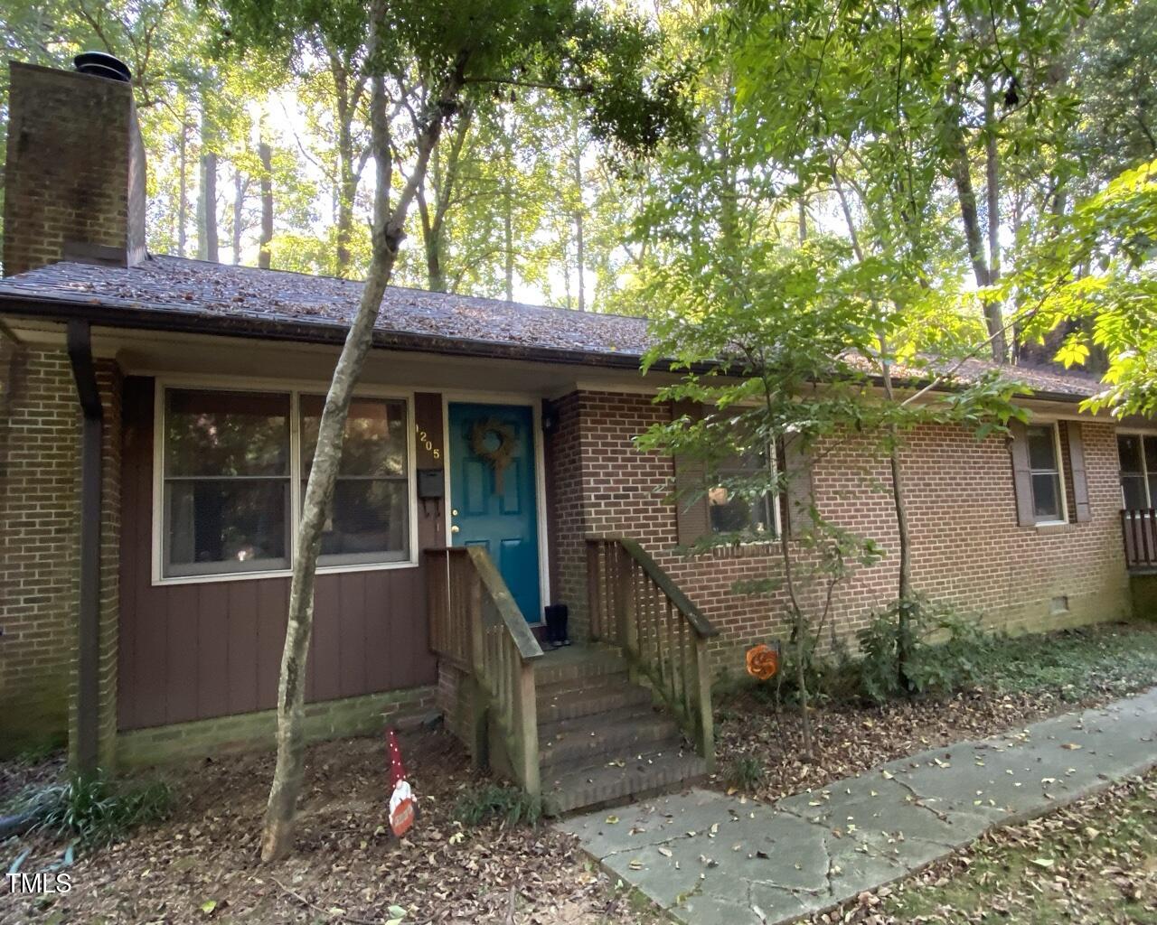 a front view of a house with a porch