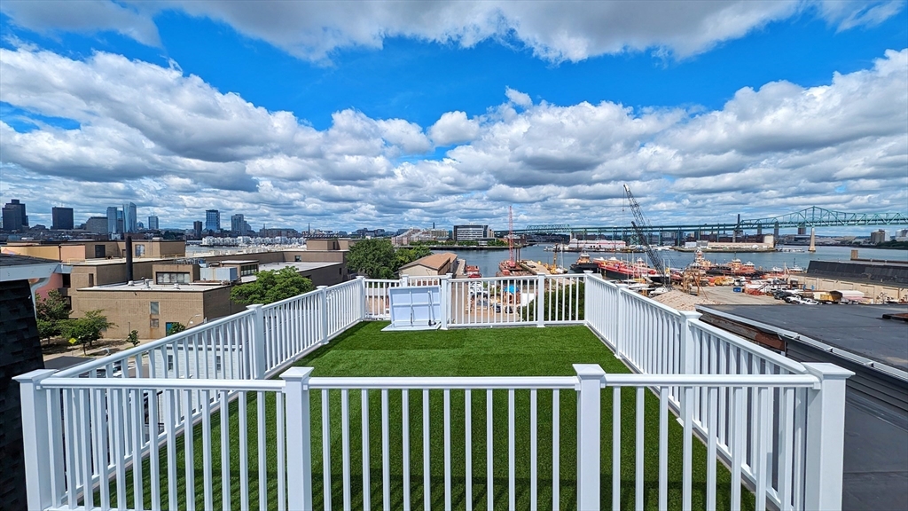 a view of a balcony with city view