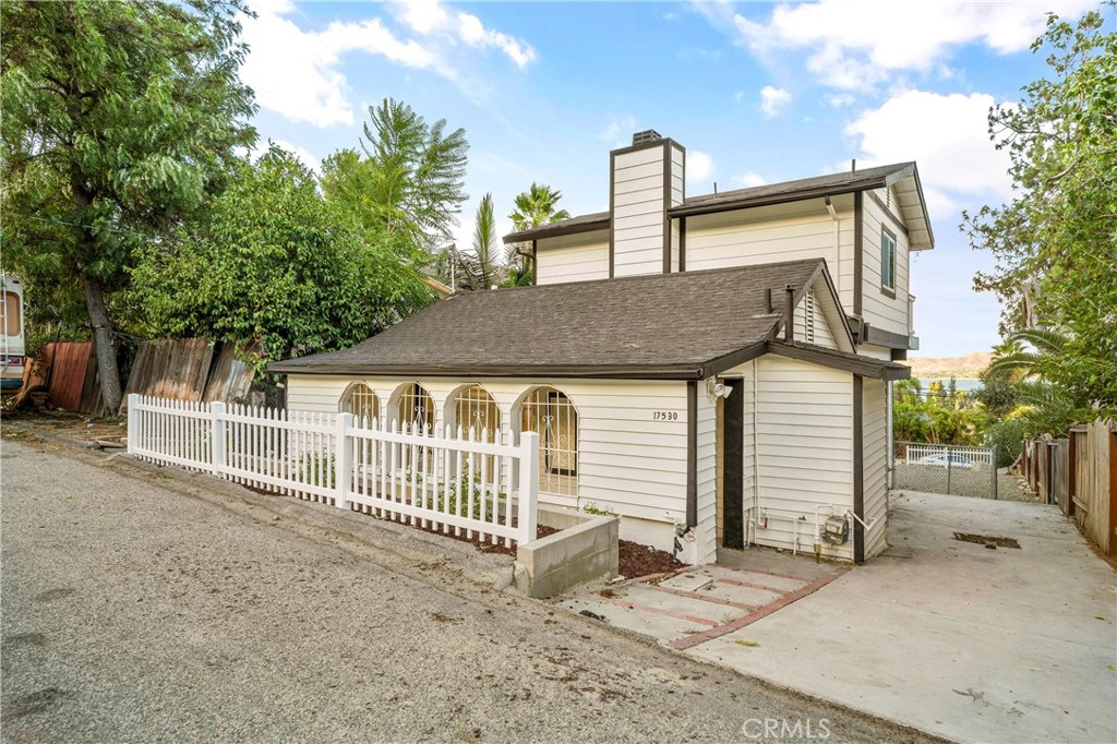 a front view of a house with a porch