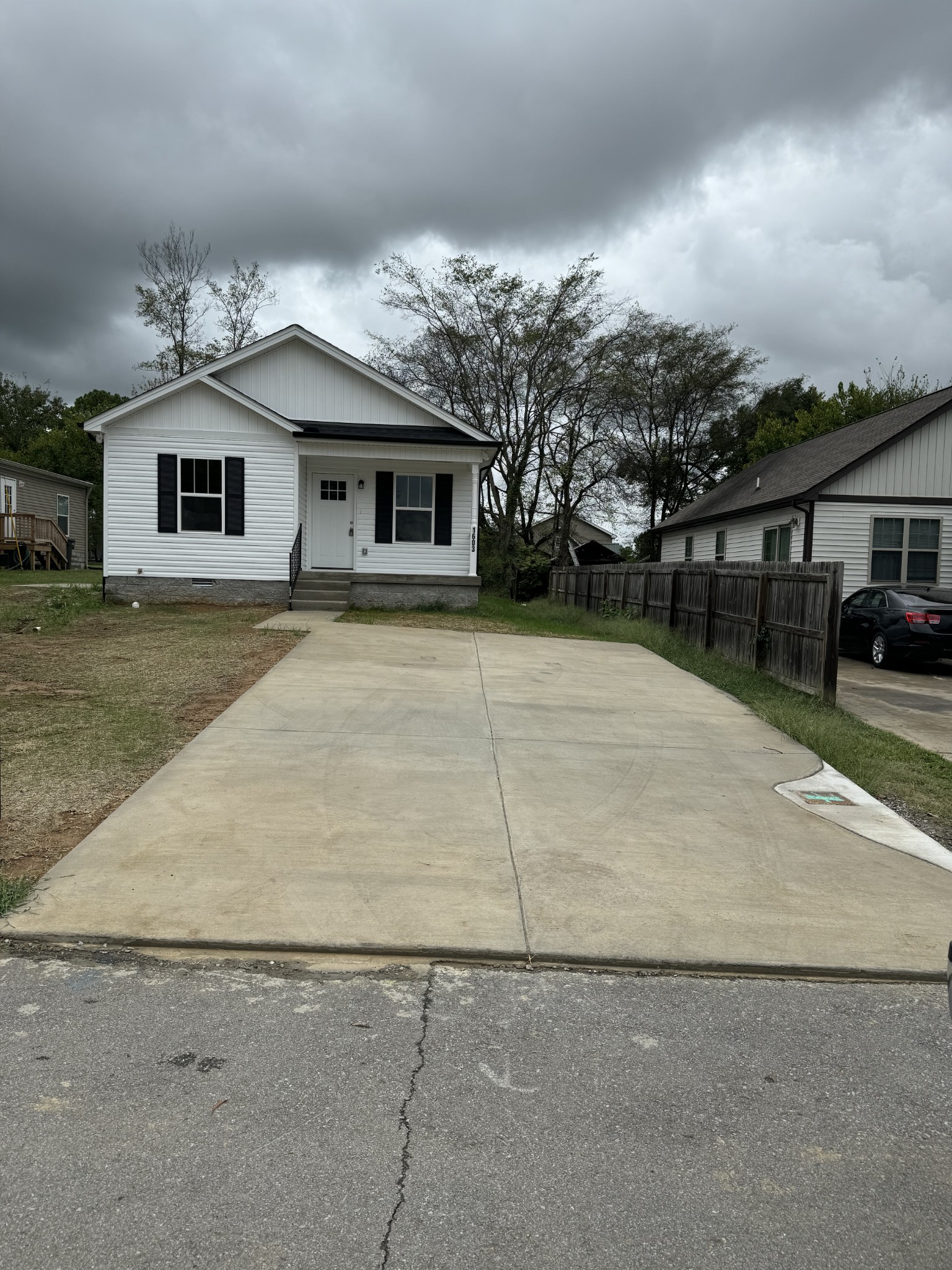 front view of a house with a yard