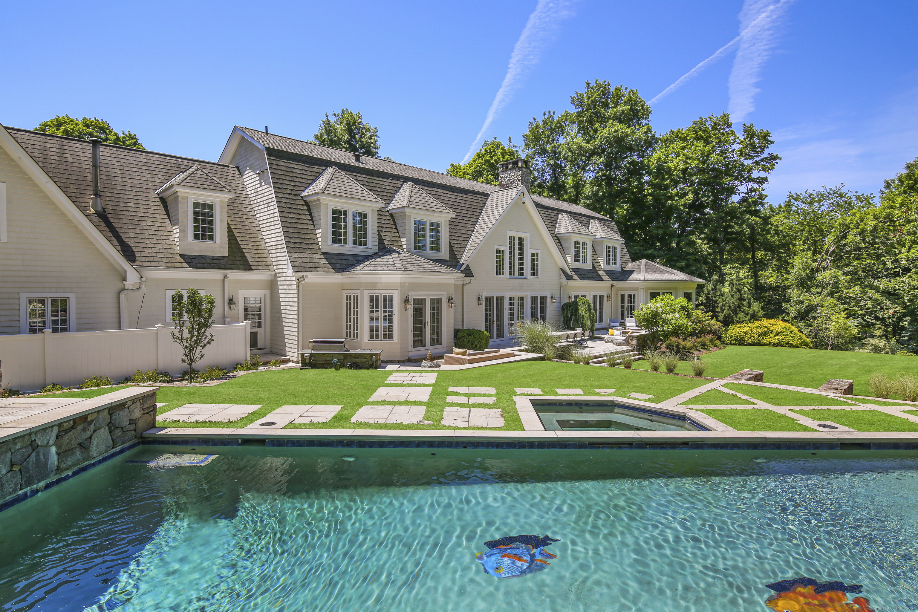 a house with garden in front of it