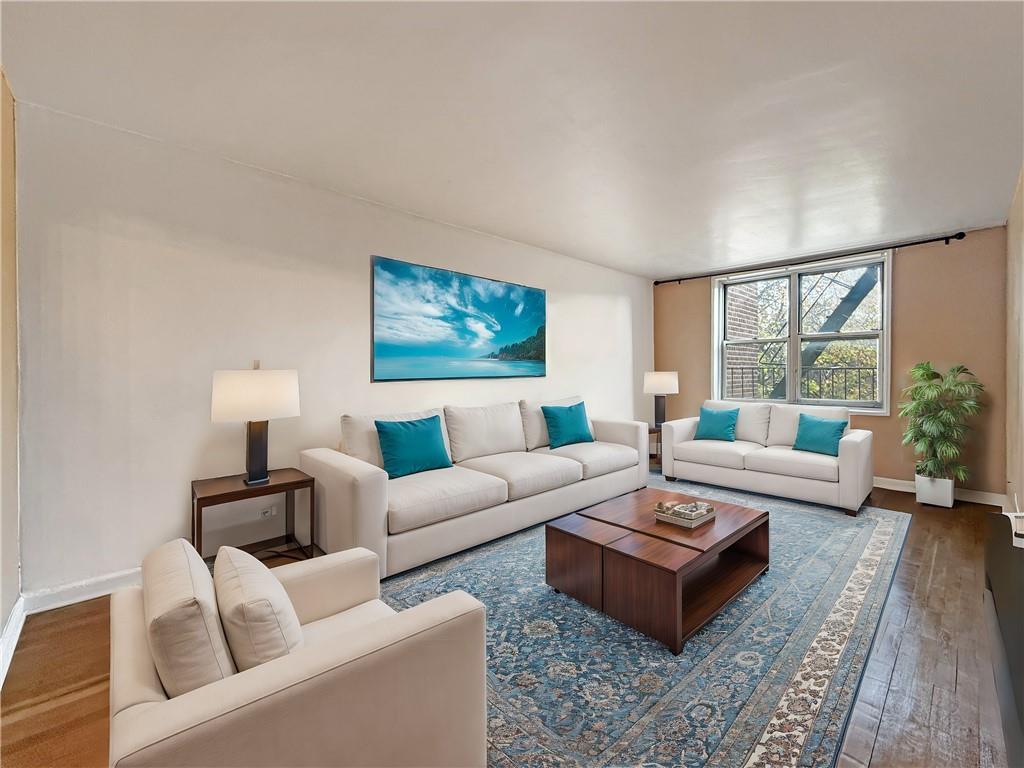 Living room featuring hardwood / wood-style flooring