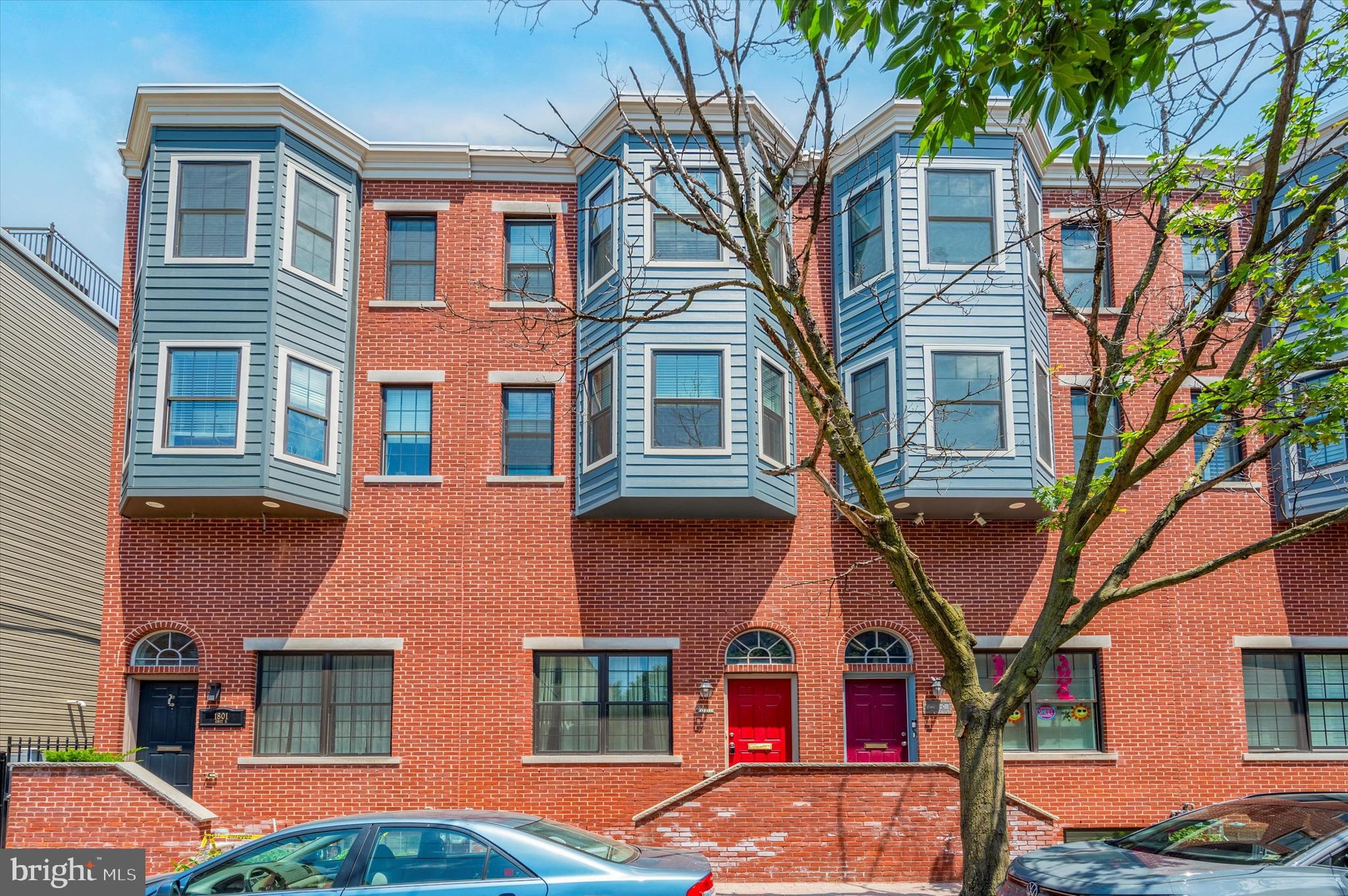 a front view of a multi story residential apartment building