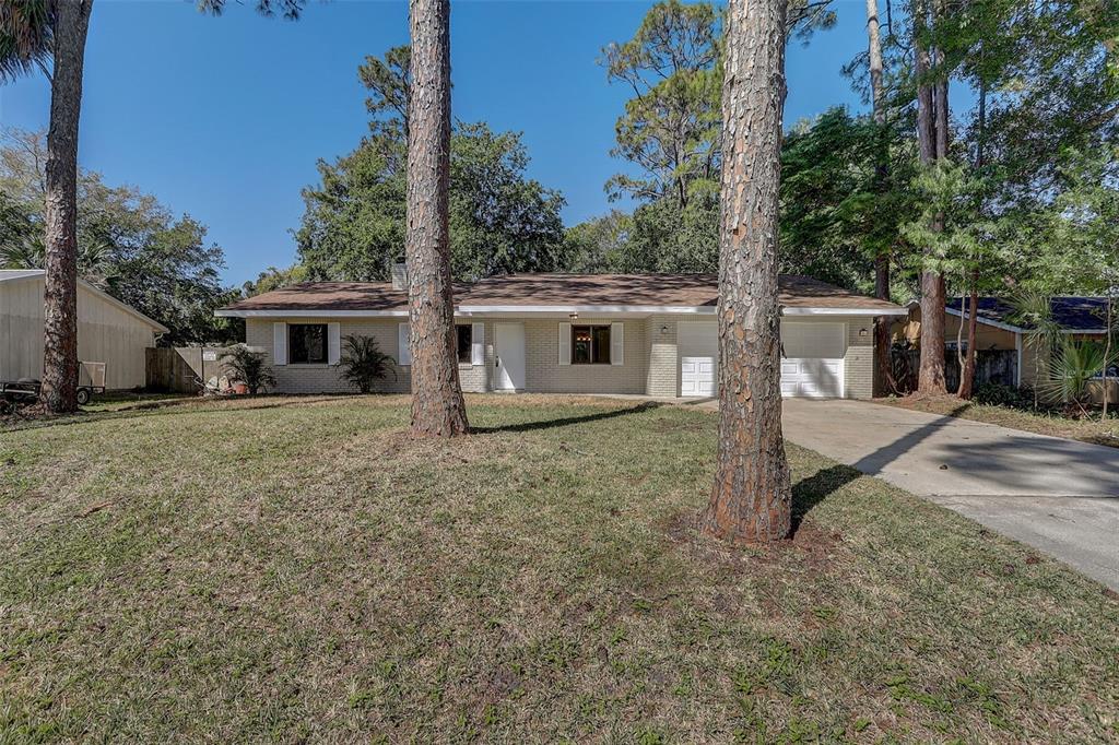 front view of a house with a yard