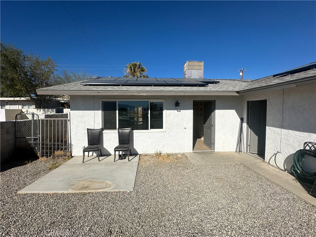 a view of a house with patio