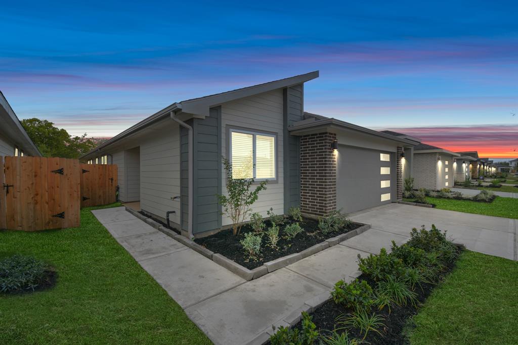 a house view with a garden space