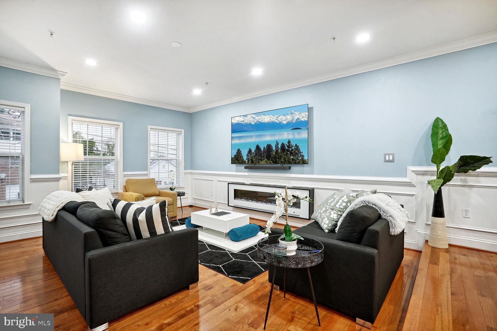 a living room with furniture and a couch