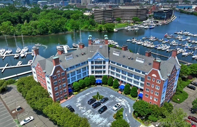 a aerial view of a house with a lake view