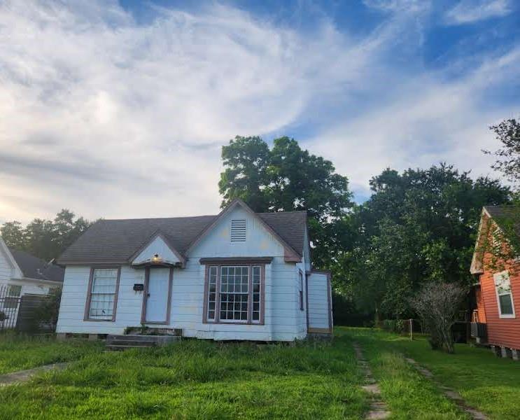 front view of a house with a yard