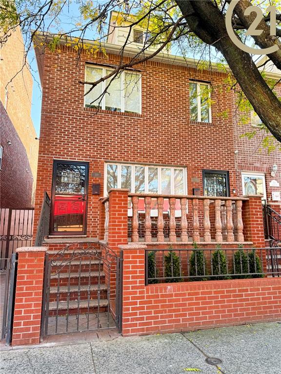 a view of entryway with a brick wall