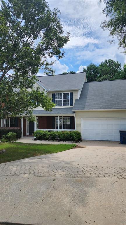 front view of house with a yard