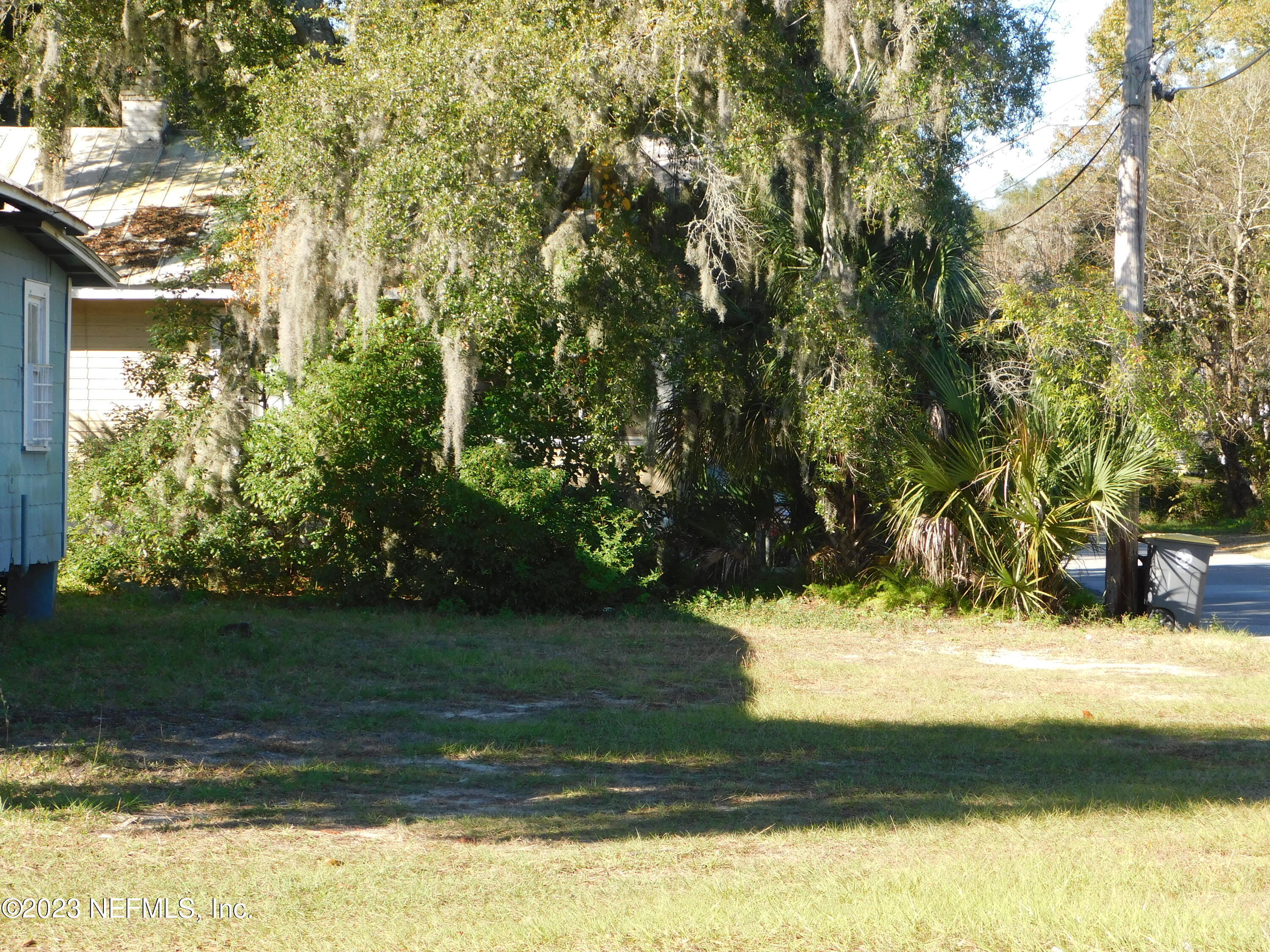 a view of swimming pool from a yard