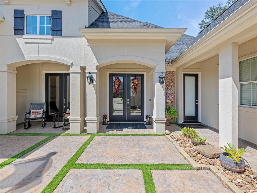 a front view of a house with a porch