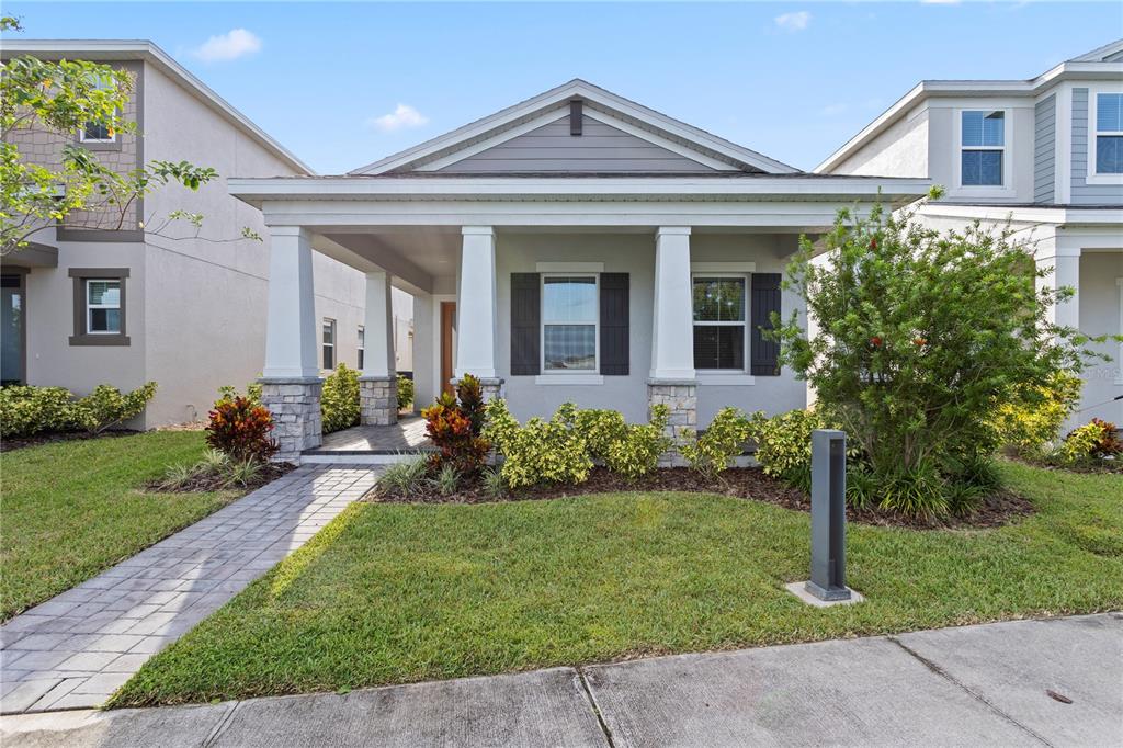 front view of a house with a yard